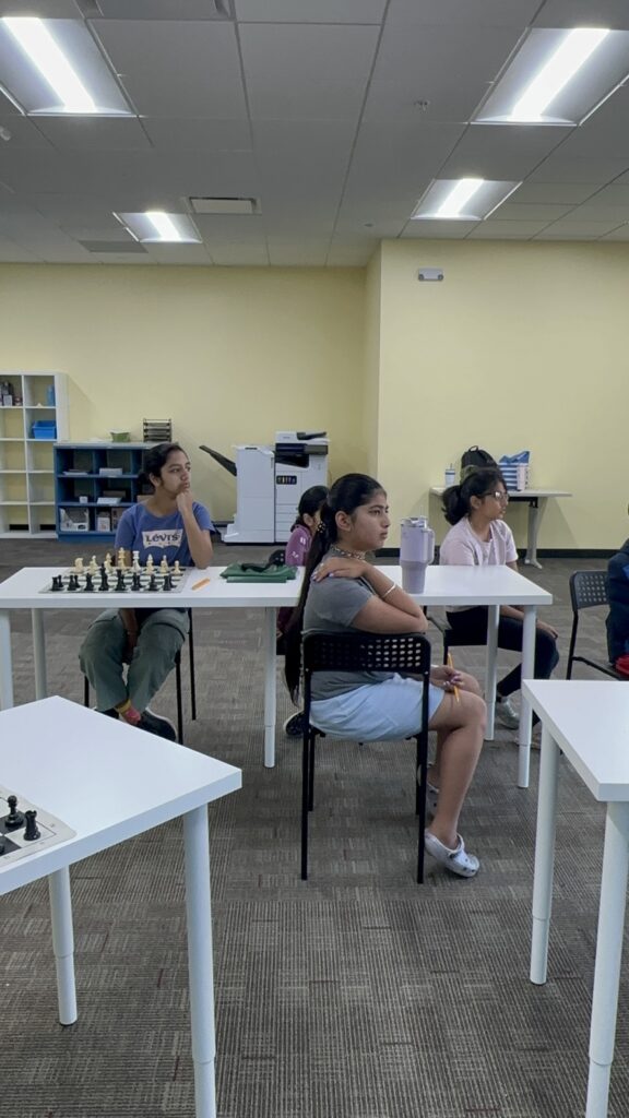 Students participating in chess camp at Y2L Academy.